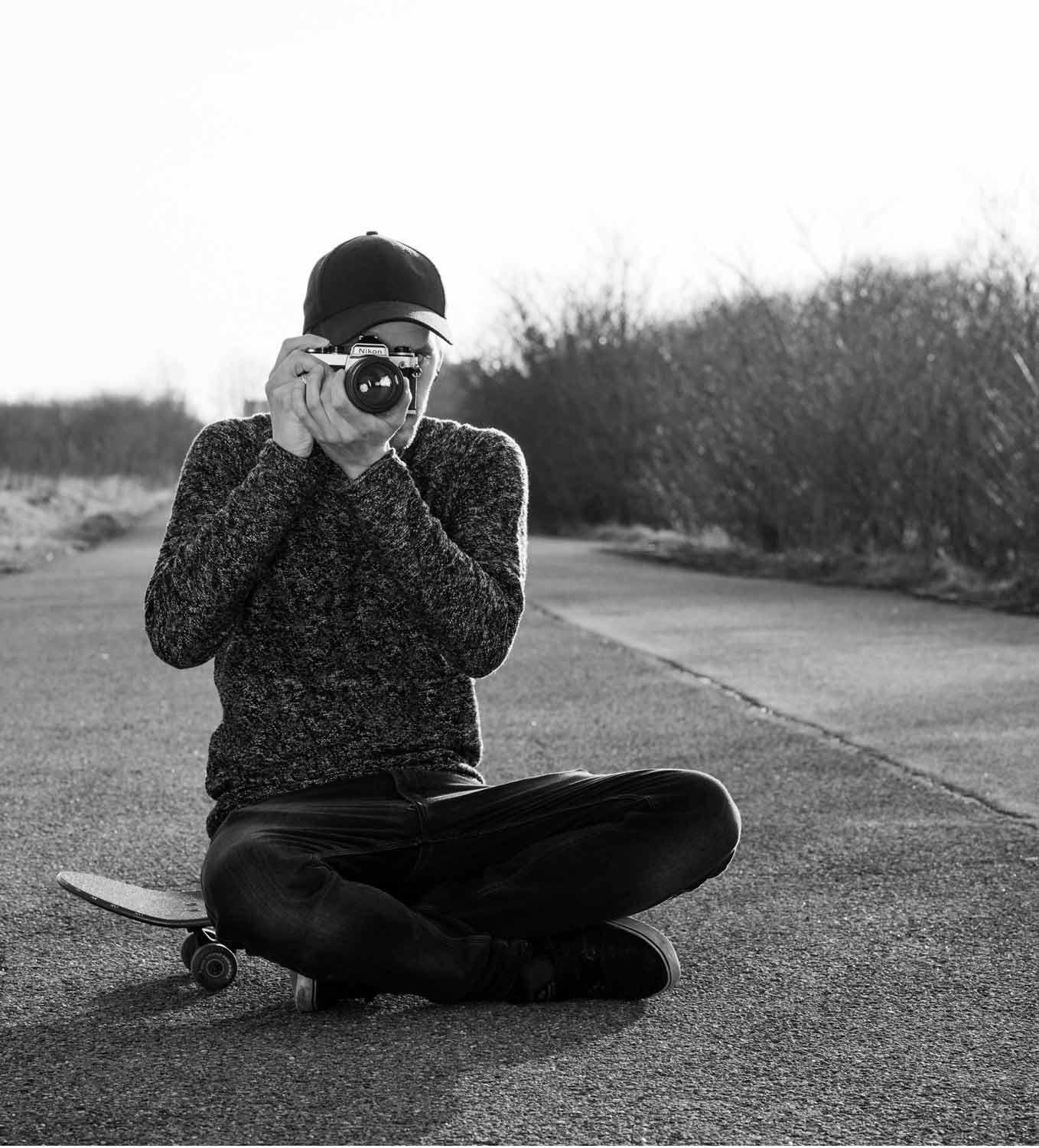 Photographer holding Camera