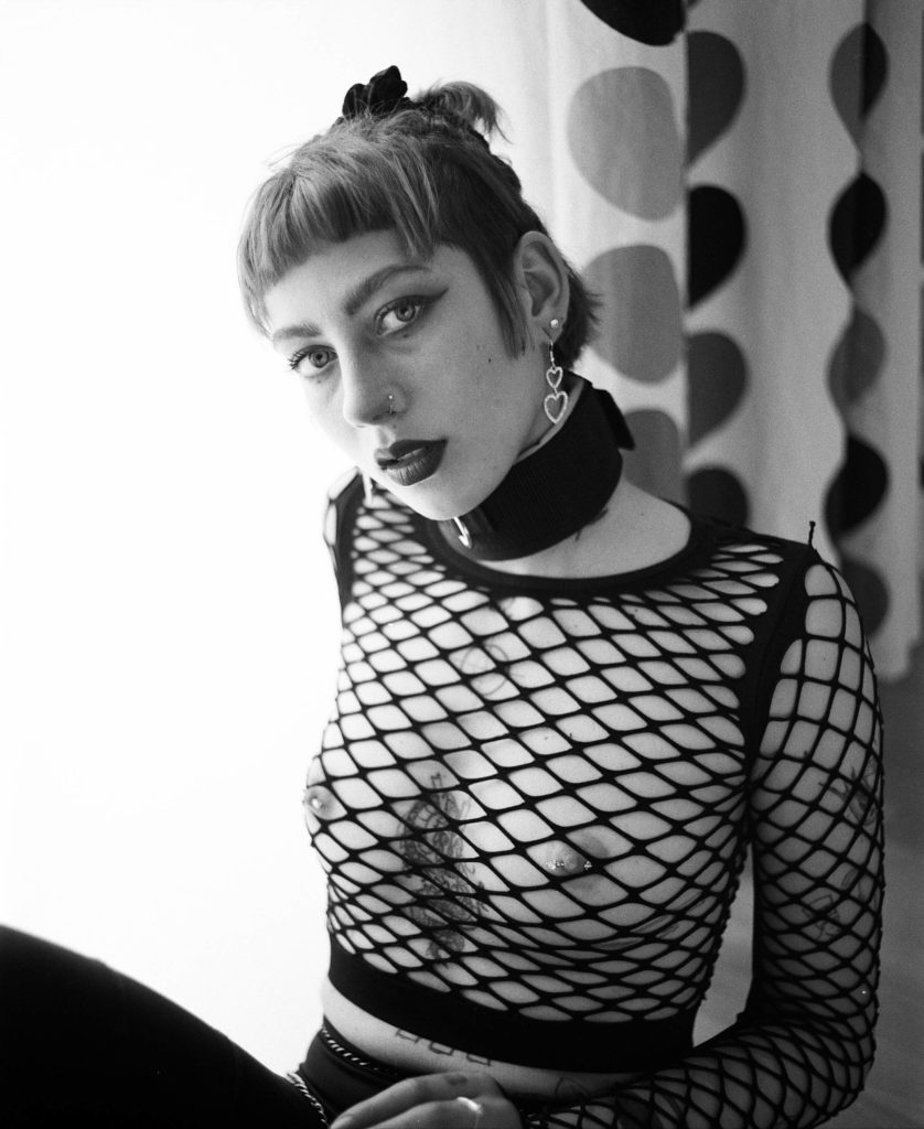 Angelina in net top nude art